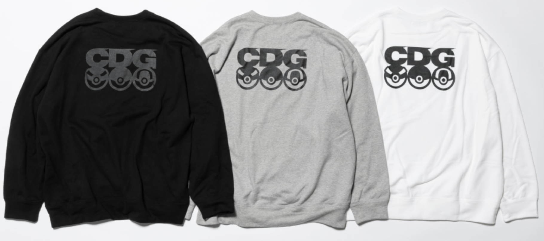 CDG sweatshirt with CDG logo and Great, Poke, and Ultra Balls underneath