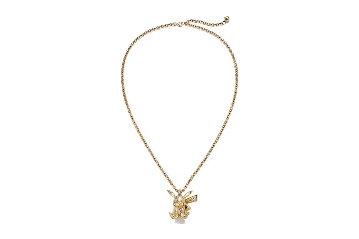 A gold chain with a gold Pikachu charm. The Pikachu has diamonds embedded in it.